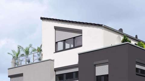 Modernes Haus mit Pultdach, Dachterrasse und Rollladen vor schrägem Fenster