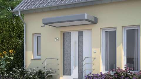 graues Vordach mit Glaseinsatz über weißer Haustür an einem hellgelben Haus