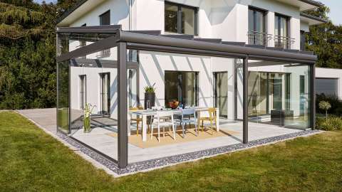 SDL Atrium plus Glashaus an einem Wohnhaus mit Garten